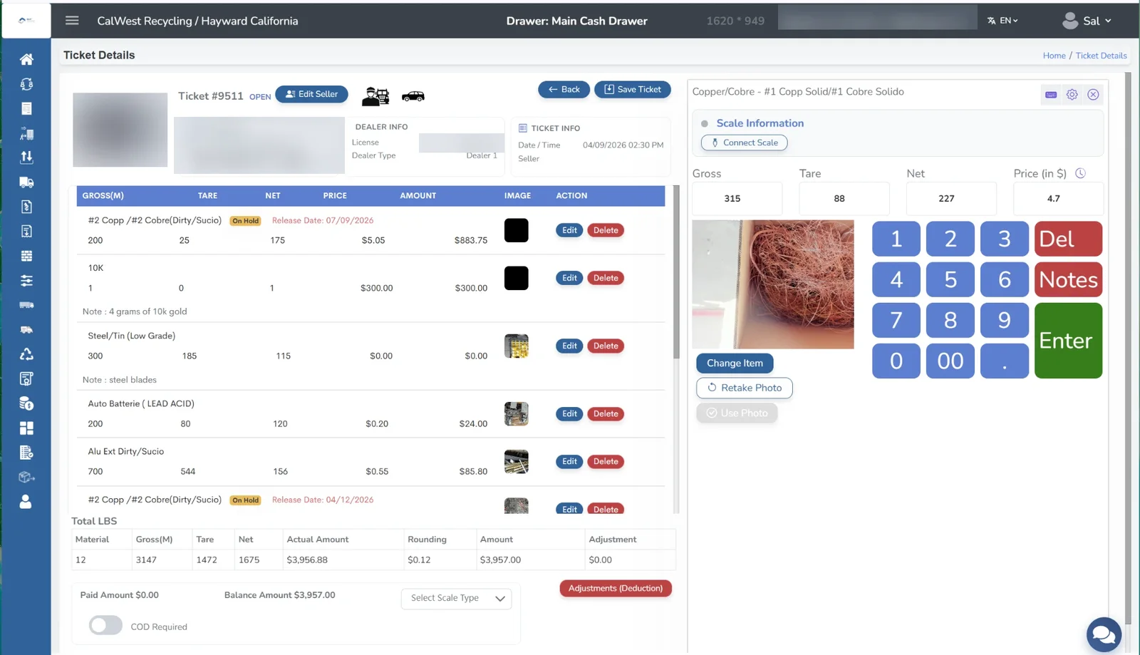 BuyScrapSoftware ticket details screen with graded materials, item photos, scale weights, and a keypad for entering price